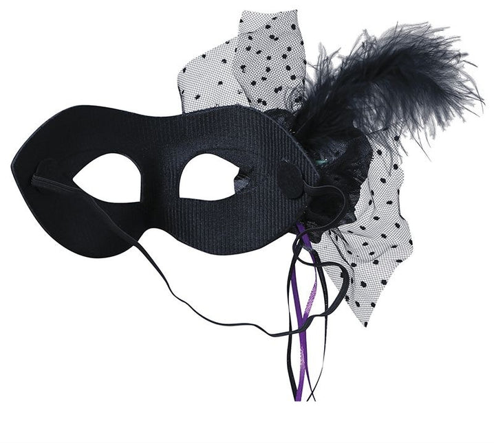 Sort øjenmaske med blomster og pailletter