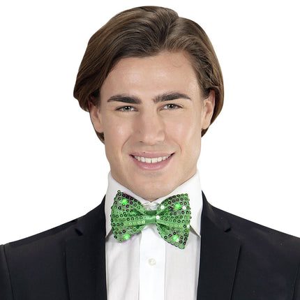 Grøn sløjfe med pailletter og lys