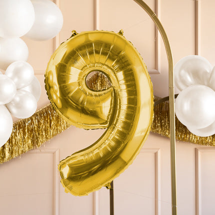 9 års figurballon guld tom 72 cm