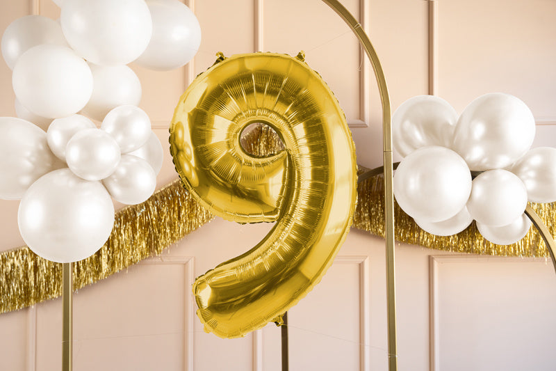 9 års figurballon guld tom 72 cm