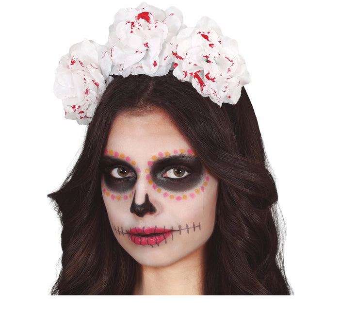 Hårbånd med blodige blomster