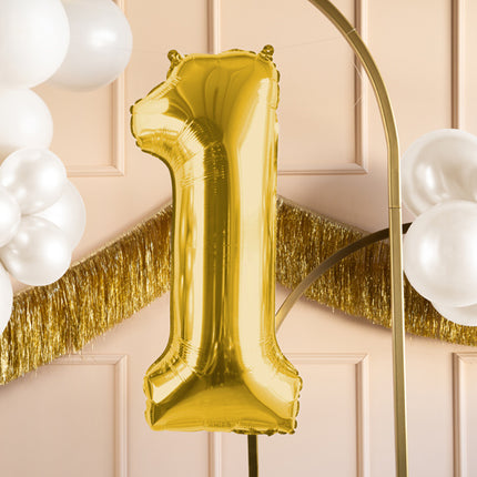 1 års figurballon guld tom 72 cm