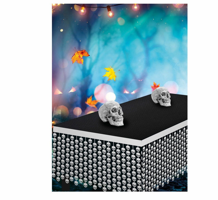 Witte Halloween Tafelrok Doodshoofden 4m van Fiestas Guirca koop je bij Partywinkel